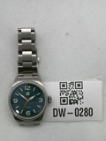 Pre-owned San Martin watch with a teal dial, orange seconds hand and stainless-steel bracelet, photographed beside tag DW-0280.